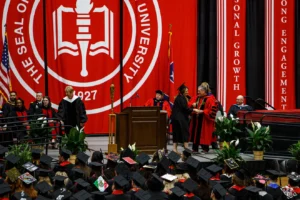 President Michael Licari hands out degrees to students graduating during the 2023 Austin Peay University commencement ceremony at the Dunn Center in Clarksville, Tenn. on May 5, 2023. Liam Kennedy / The Leaf Chronicle
